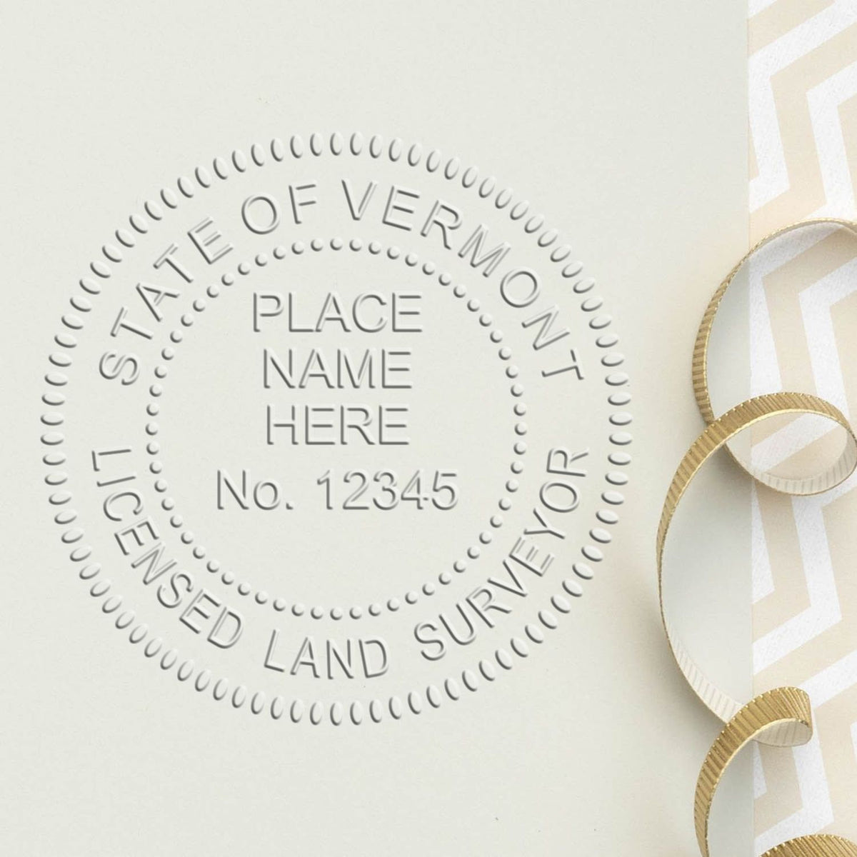 A lifestyle photo showing a stamped image of the State of Vermont Soft Land Surveyor Embossing Seal on a piece of paper