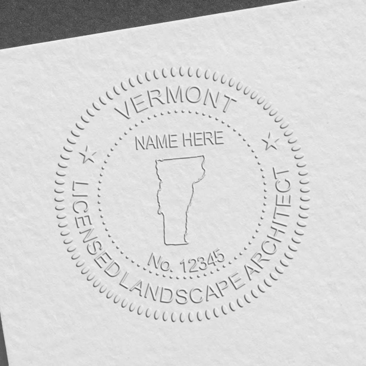 The Gift Vermont Landscape Architect Seal stamp impression comes to life with a crisp, detailed image stamped on paper - showcasing true professional quality.