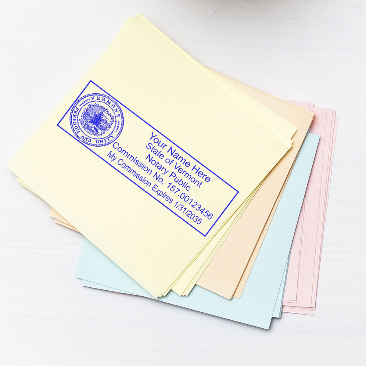 This paper is stamped with a sample imprint of the Wooden Handle Vermont State Seal Notary Public Stamp, signifying its quality and reliability.