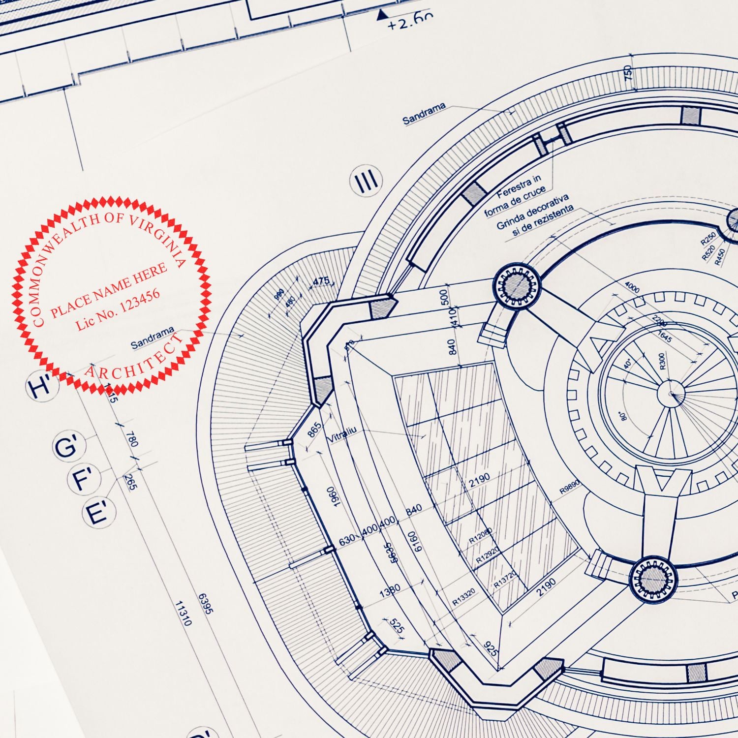 Blueprint with a red Self Inking Virginia Architect Stamp marking the document, showing architectural details and the stamp's clear imprint.