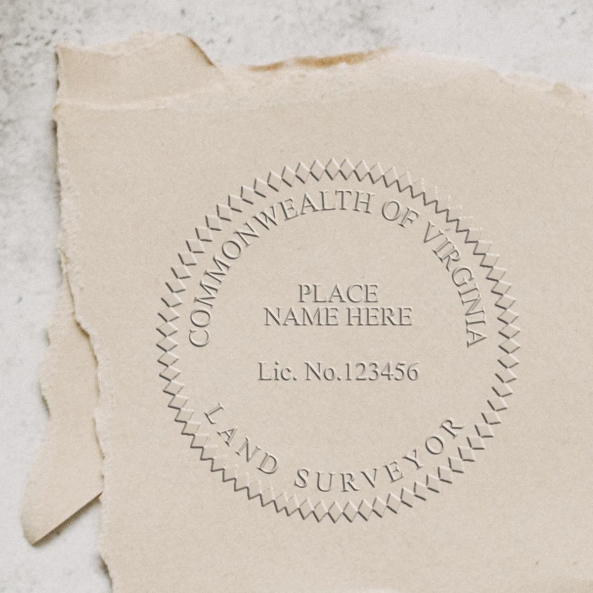 A lifestyle photo showing a stamped image of the State of Virginia Soft Land Surveyor Embossing Seal on a piece of paper