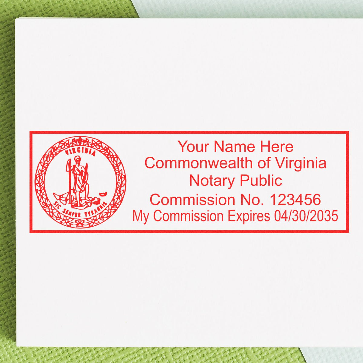 An alternative view of the MaxLight Premium Pre-Inked Virginia State Seal Notarial Stamp stamped on a sheet of paper showing the image in use