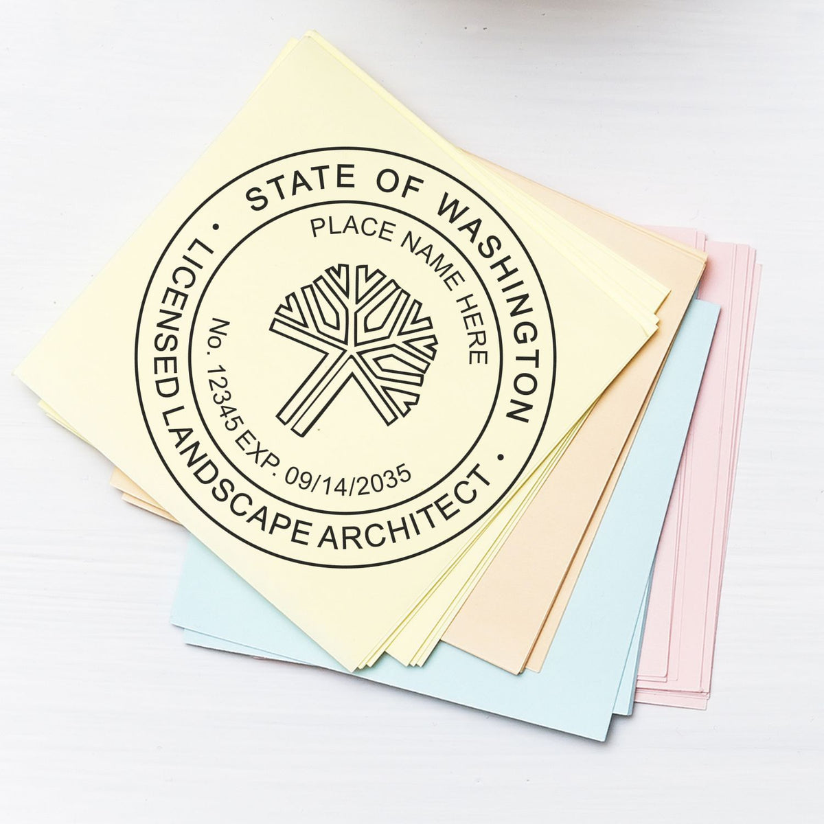 This paper is stamped with a sample imprint of the Slim Pre-Inked Washington Landscape Architect Seal Stamp, signifying its quality and reliability.
