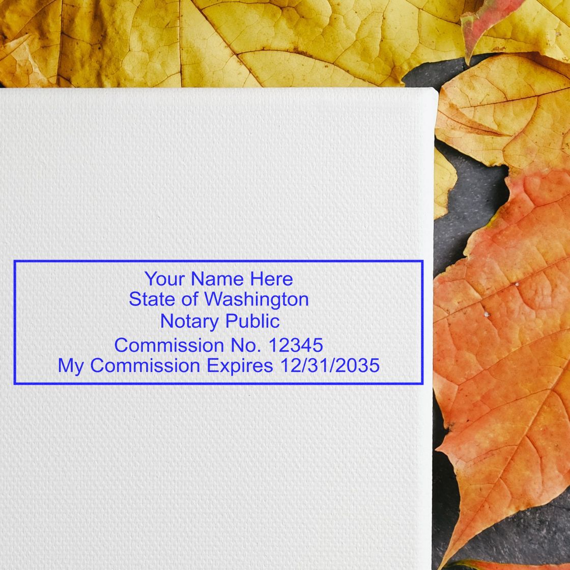 This paper is stamped with a sample imprint of the Wooden Handle Washington Rectangular Notary Public Stamp, signifying its quality and reliability.