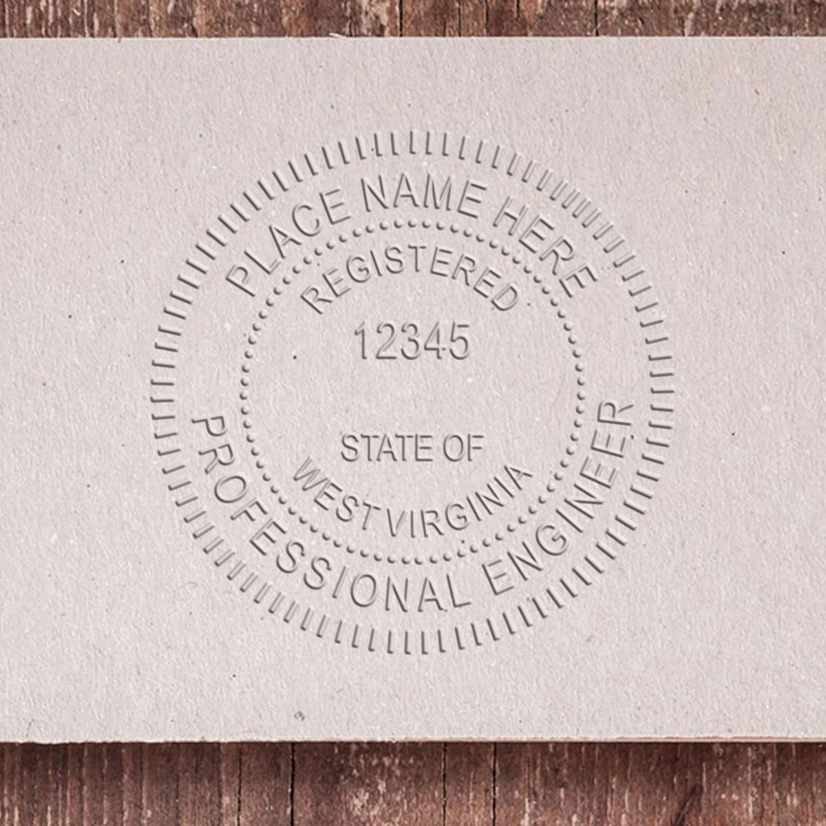 The State of West Virginia Extended Long Reach Engineer Seal stamp impression comes to life with a crisp, detailed photo on paper - showcasing true professional quality.
