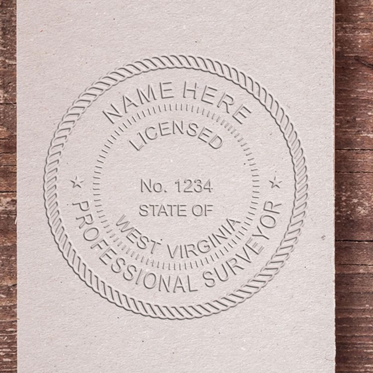 A lifestyle photo showing a stamped image of the State of West Virginia Soft Land Surveyor Embossing Seal on a piece of paper