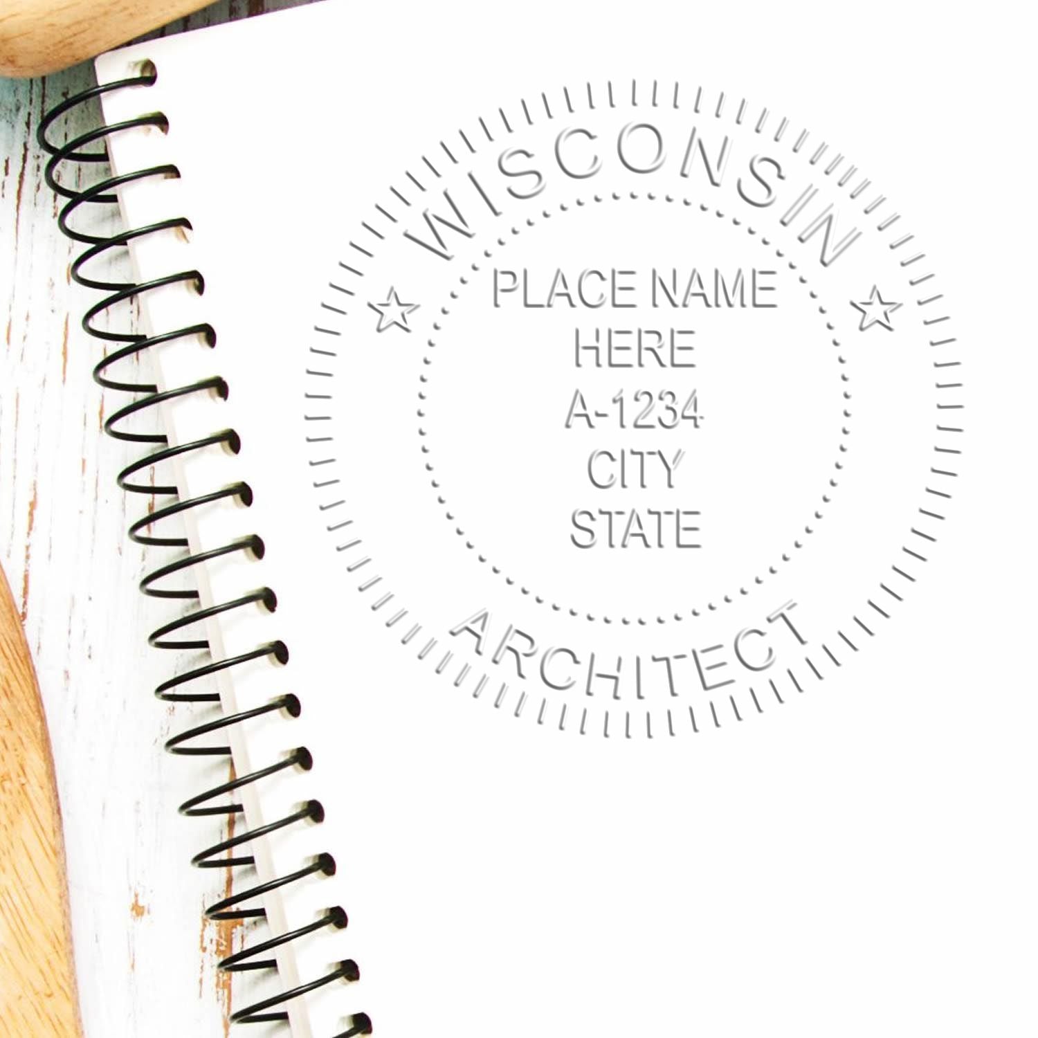 A stamped impression of the State of Wisconsin Architectural Seal Embosser in this stylish lifestyle photo, setting the tone for a unique and personalized product.