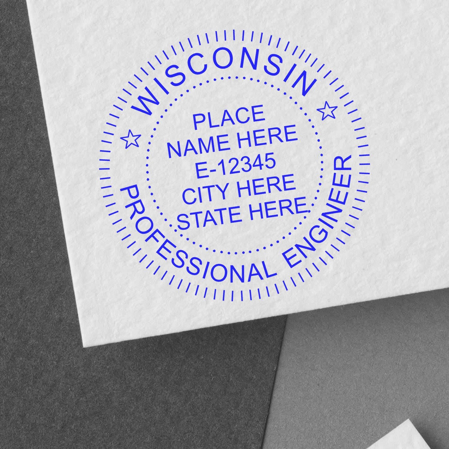 A lifestyle photo showing a stamped image of the Premium MaxLight Pre-Inked Wisconsin Engineering Stamp on a piece of paper