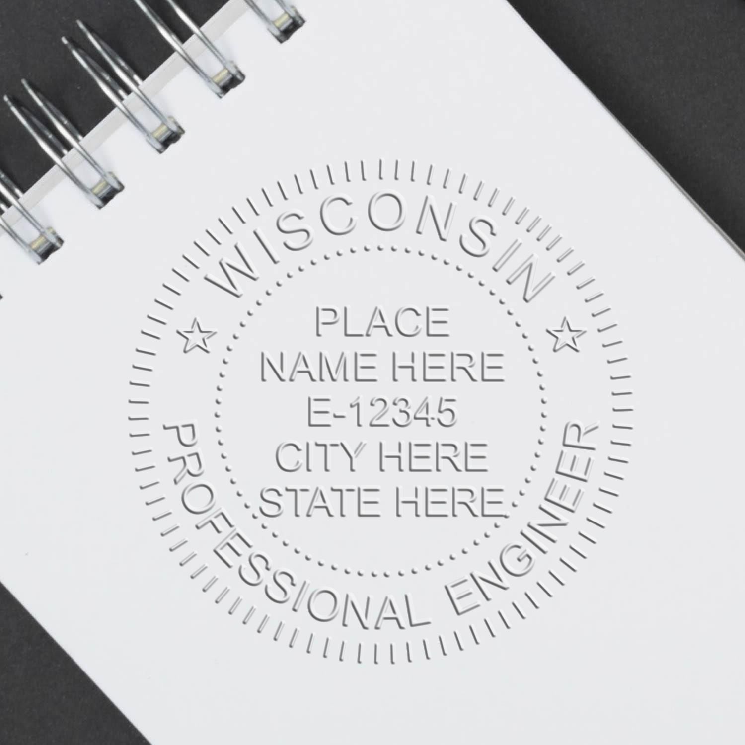 A photograph of the Soft Wisconsin Professional Engineer Seal stamp impression reveals a vivid, professional image of the on paper.