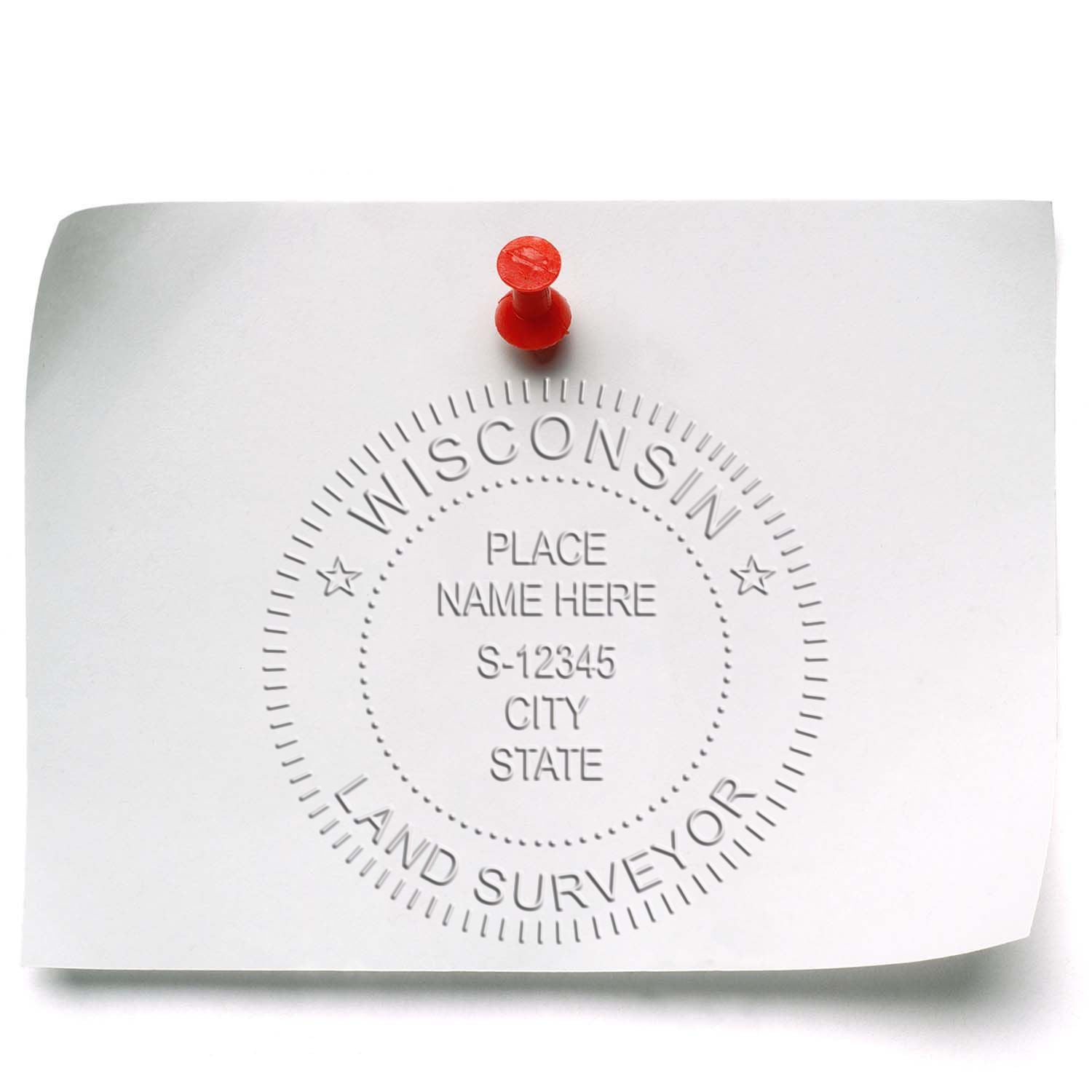 An in use photo of the Gift Wisconsin Land Surveyor Seal showing a sample imprint on a cardstock