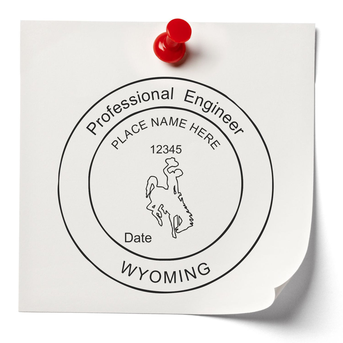 A lifestyle photo showing a stamped image of the Digital Wyoming PE Stamp and Electronic Seal for Wyoming Engineer on a piece of paper