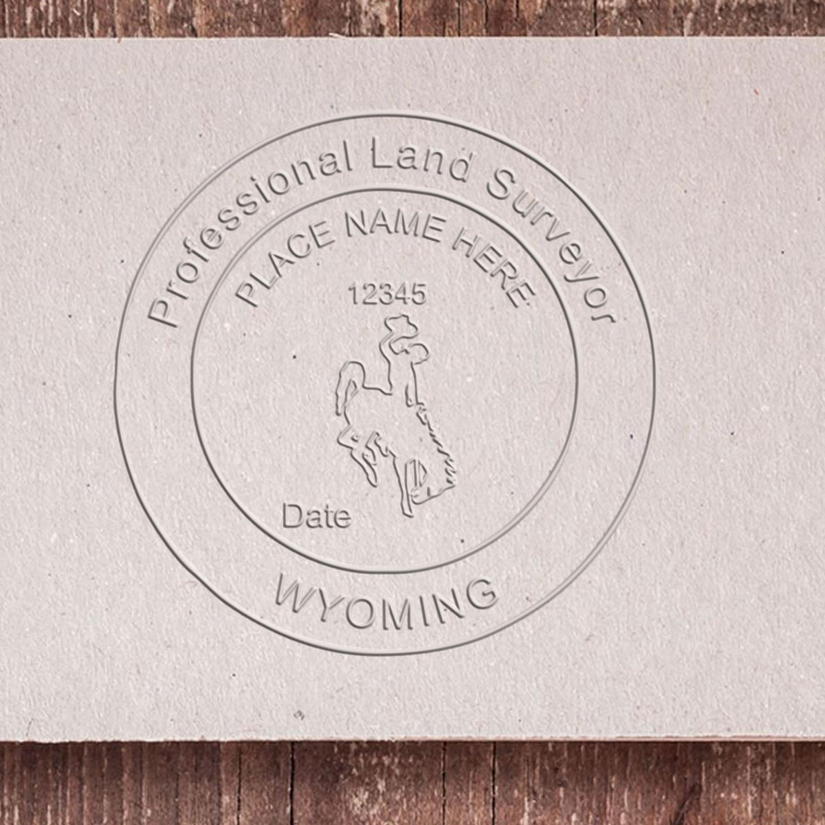 A photograph of the Hybrid Wyoming Land Surveyor Seal stamp impression reveals a vivid, professional image of the on paper.