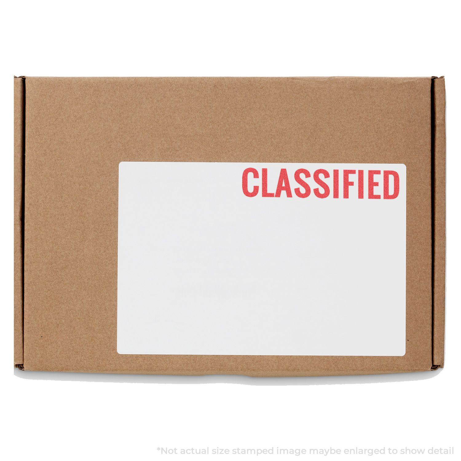 Brown box with a white label stamped CLASSIFIED in red using the Classified Xstamper Stamp.