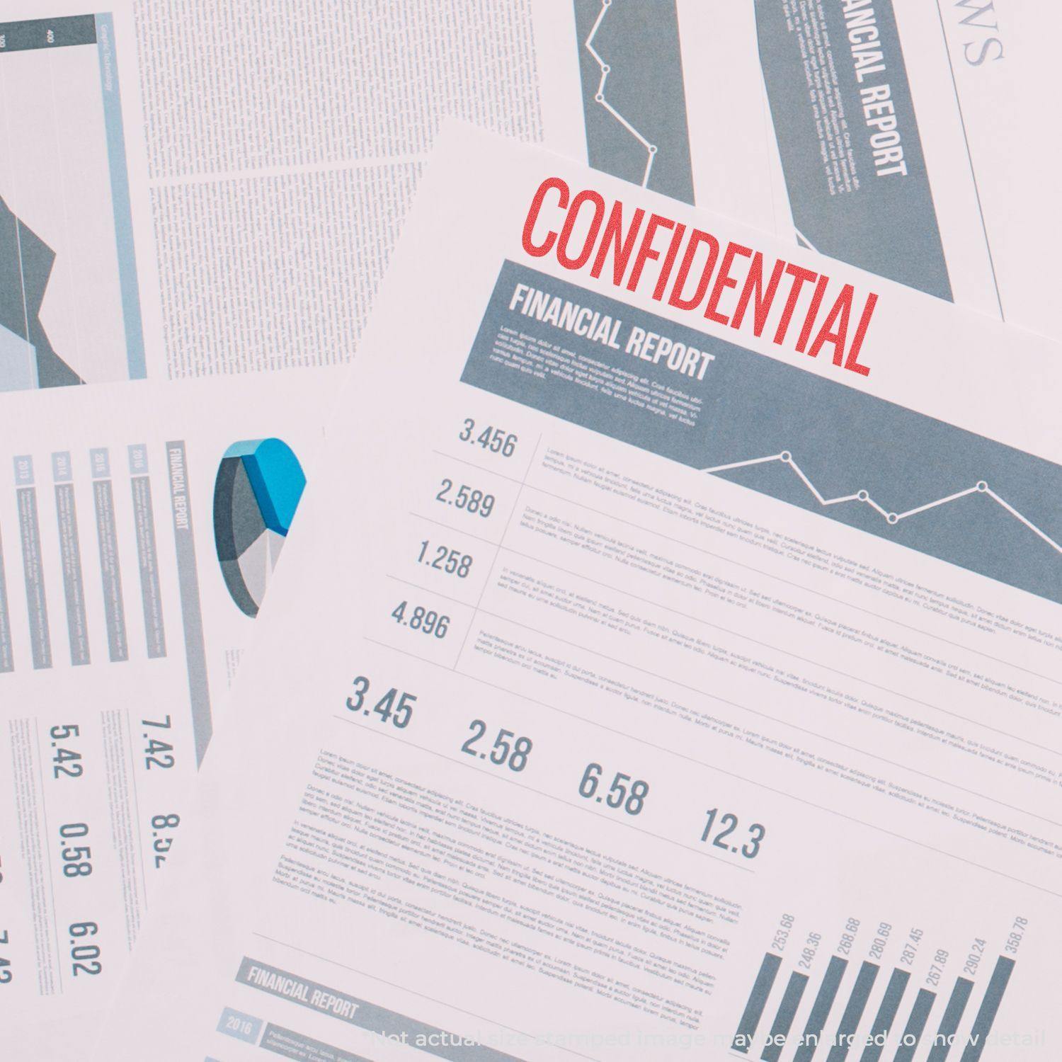 Jumbo Bold Red Confidential Xstamper Stamp marking CONFIDENTIAL on financial reports with charts and graphs in the background.