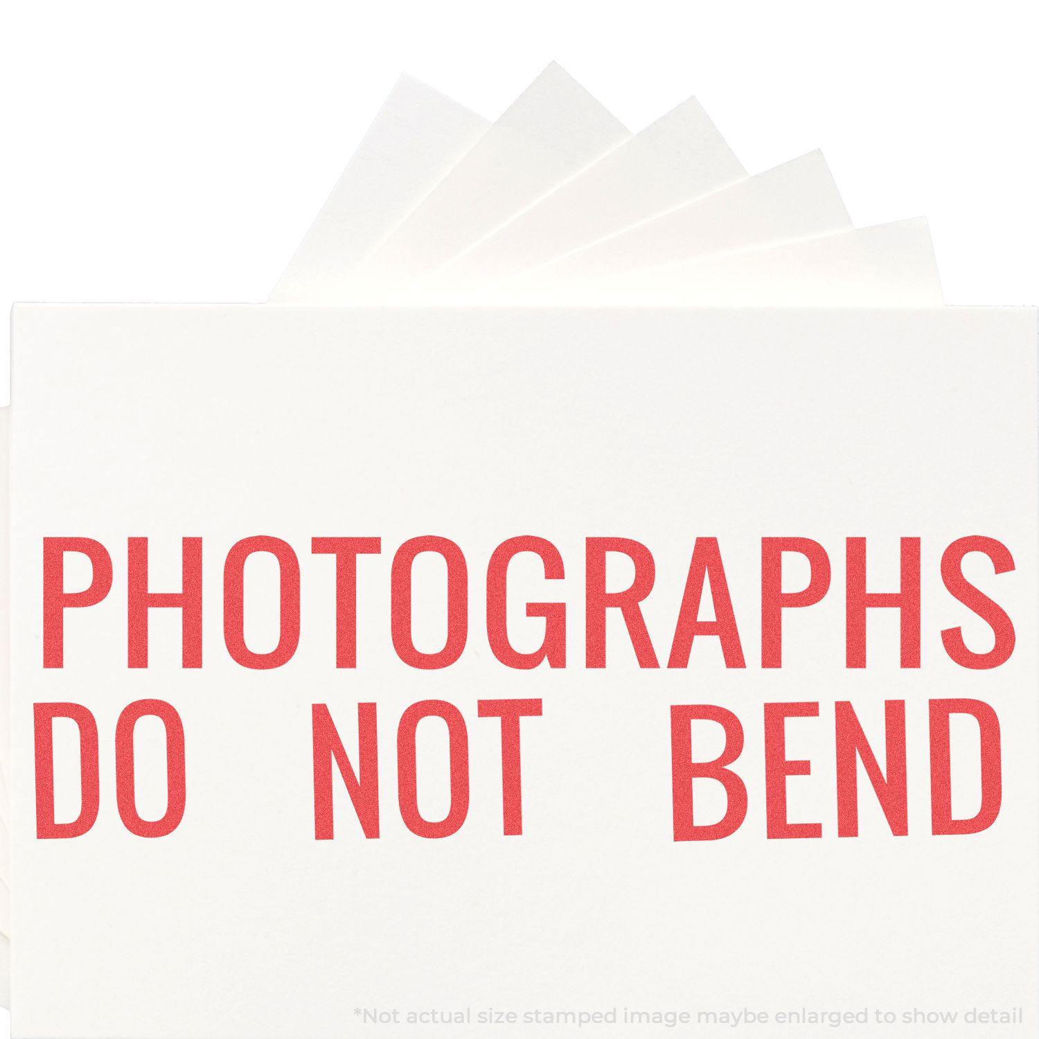 In Use Photo of Jumbo Photographs Do Not Bend Xstamper Stamp