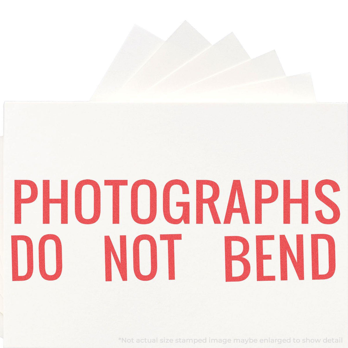 In Use Photo of Jumbo Photographs Do Not Bend Xstamper Stamp