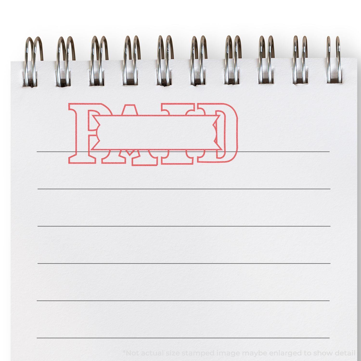 A Red Paid Xstamper Stamp imprint on a spiral-bound notepad with lined paper, showing the word PAID in bold red letters.