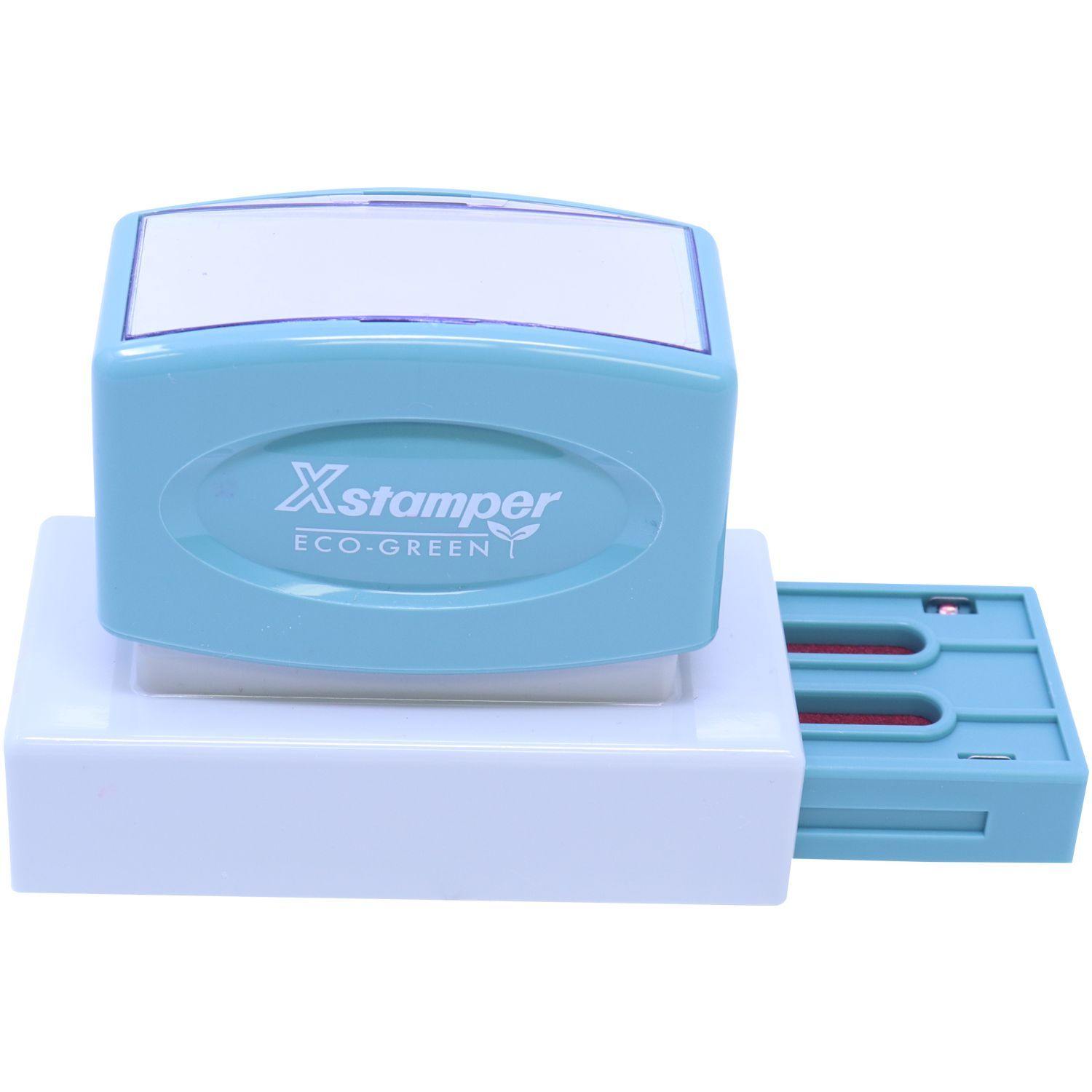 Jumbo Red Copy Xstamper Stamp with a blue handle and white base, featuring the Xstamper Eco-Green logo, shown in a front view.